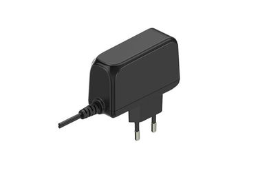 Un buon prezzo. adattatore di corrente continua di CA di 12V 2A con la spina di UE, alimentazione elettrica di commutazione del supporto della parete in linea