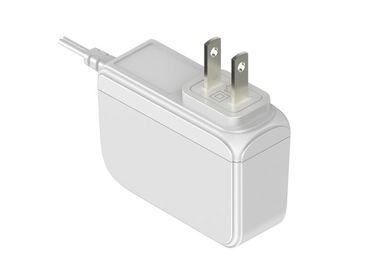 Un buon prezzo. adattatore universale bianco/del nero dell'alimentazione elettrica di commutazione di CA di 12v 1.5A 18w Stati Uniti della spina di potere in linea